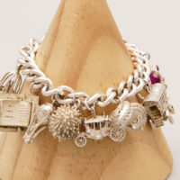 Vintage Heavy Silver Charm Bracelet 1977 – 10 Charms 4