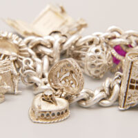 Vintage Heavy Silver Charm Bracelet 1977 – 10 Charms 7