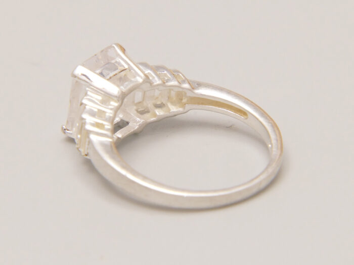 Sterling Silver Emerald Step Cut Cubic Zirconia Travel Ring 9